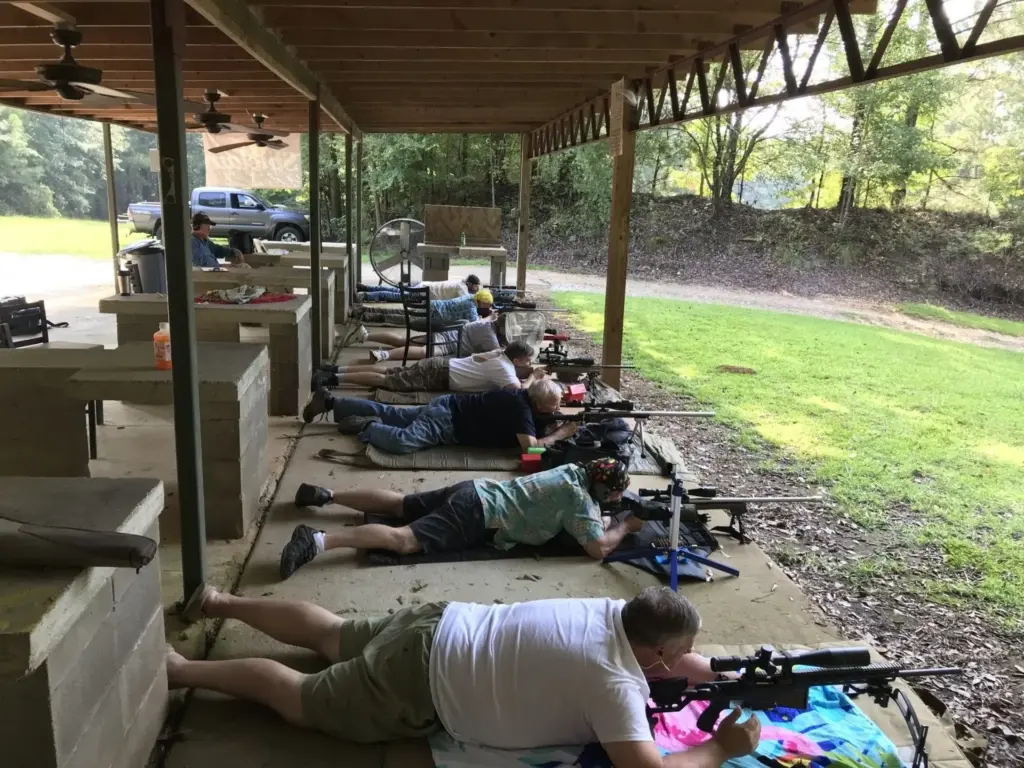 Shooters prone on the covered rifle line